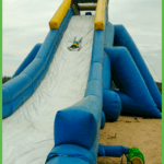 Water Slide with Kid Coming Down Head First