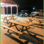 Picnic Tables on the Patio Under the Lights