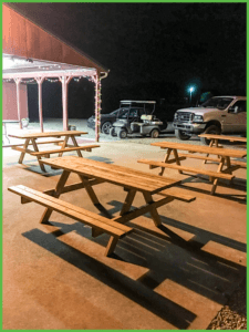 Picnic Tables on the Patio Under the Lights